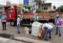 Ponto de coleta da Grande Coleta de Emaús em Belém, com caixas de doações organizadas para recebimento
